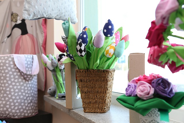 Flowers sitting on a window shelf